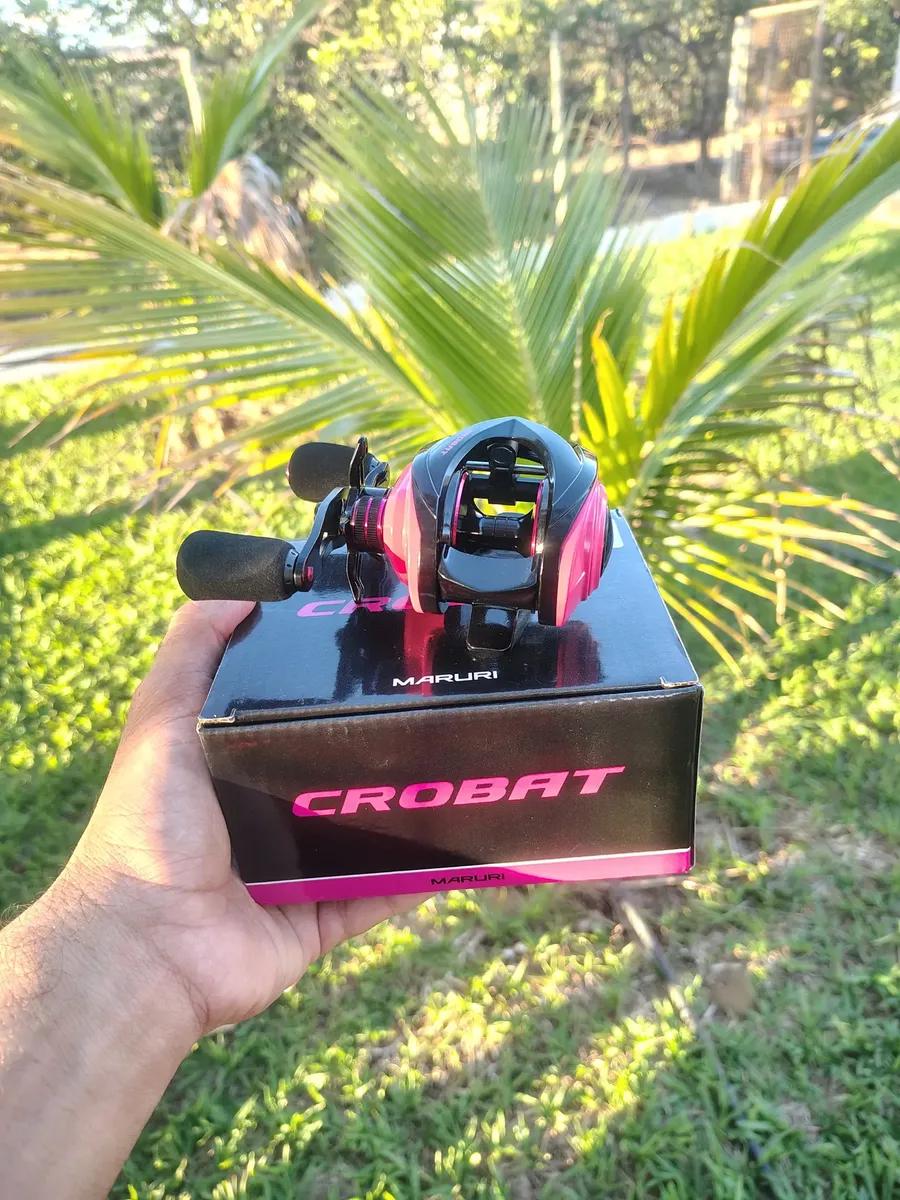 🚚 Carretilha Maruri New Crobat 7+1 Rolamentos Drag 7kg - Rosa - Esquerdo